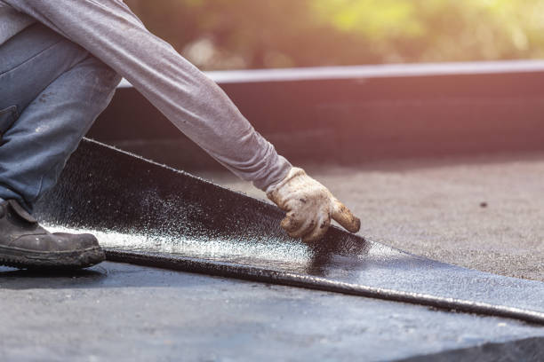 Professional Interior Drainage System technician working in Great River, NY